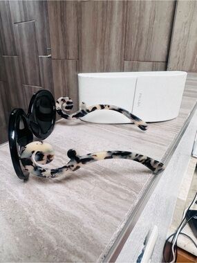 Prada Black Lensed Sunglasses with Cream Tortoiseshell Swirl Arms